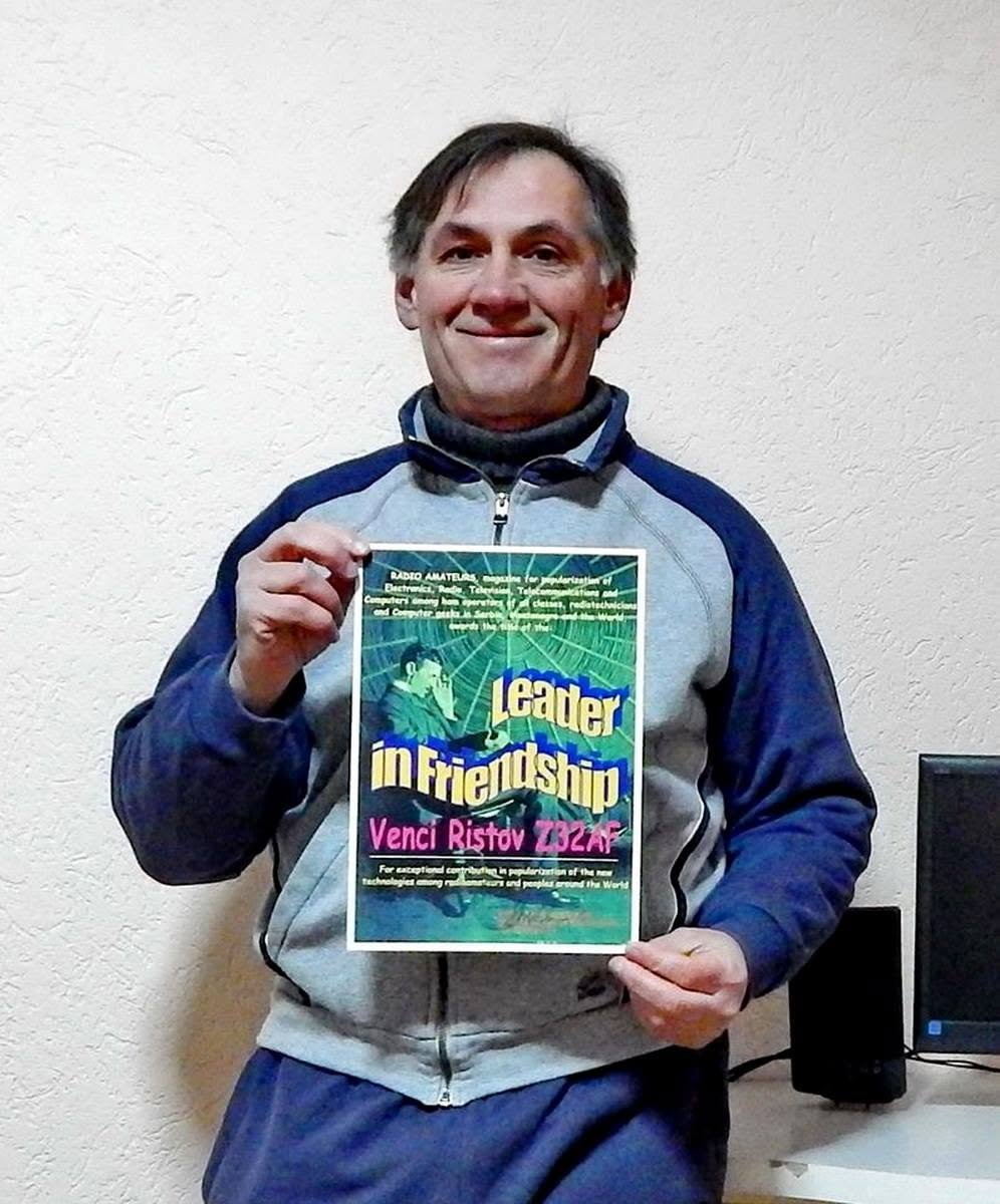 Venci Ristov receiving the Leader in Friendship diploma from the magazine Radioamateri, 2003